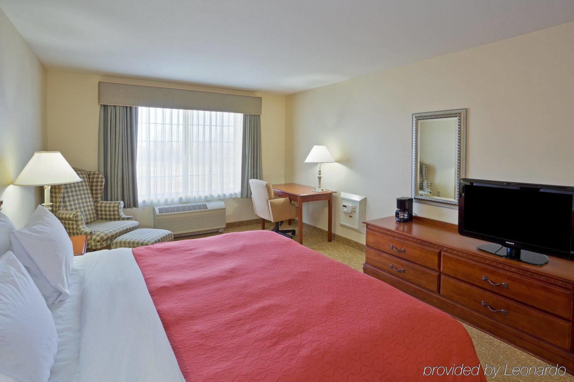 Country Inn & Suites By Radisson, Big Rapids, Mi Bagian luar foto
